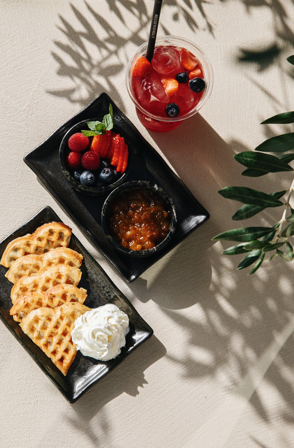 Swedish thin waffles served with fresh berries, jam and whipped cream. Halm Cafe, Jumeirah Beach Road.