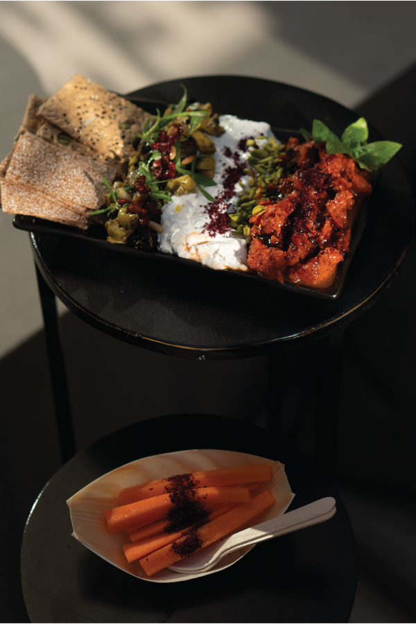 Whipped fea with red and green company. Served from Halm Cafe menu, Jumeirah Dubai. High-protein healthy food.