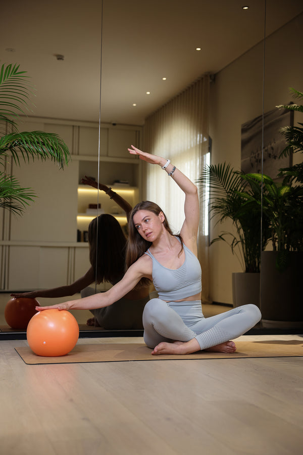 pilates studio using mat and ball
